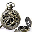 Elder Brain (Brass) - 7 Piece Mini Metal Polyhedral Dice Set & Pocket Watch Style Case